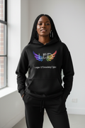 Black woman wearing L.E.D. rainbow wings sweatsuit set